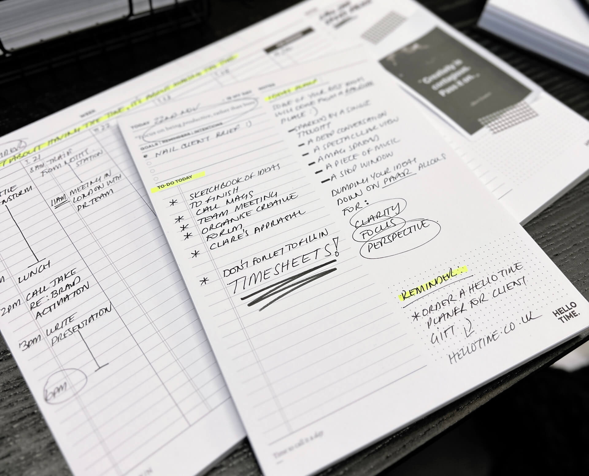 Open HELLO TIME daily planner filled with handwritten notes and to-do lists, highlighted in yellow — a snapshot of organised, focused productivity.