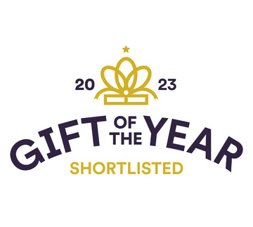 Gift of the Year 2023 Shortlisted logo featuring a gold ribbon emblem and bold typography celebrating design excellence.