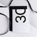 White 30th birthday card with bold black number and black envelope.