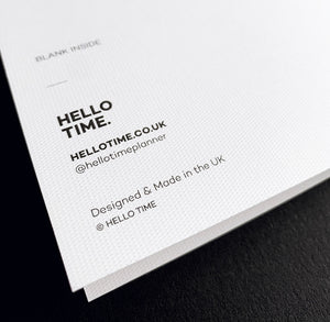 Back of white card showing HELLO TIME branding and FSC-certified textured stock, blank inside.