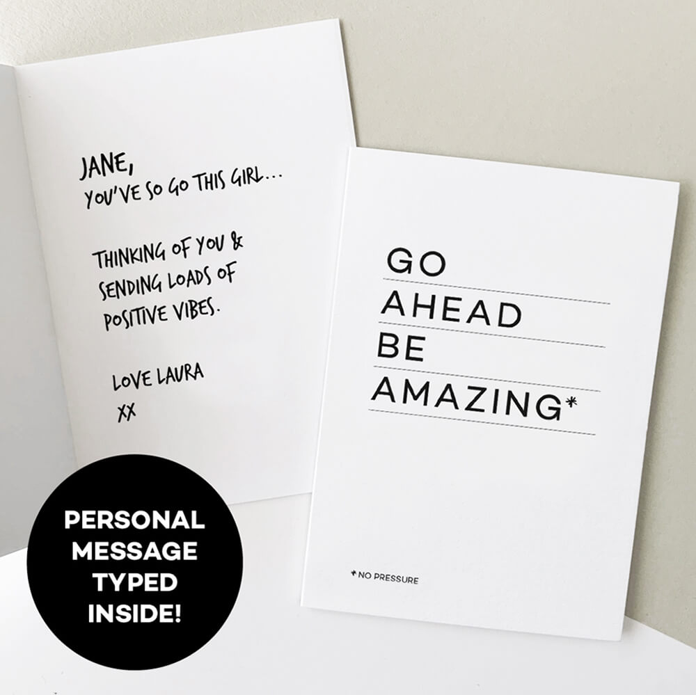Open greetings card showing personalised handwritten message beside “Go Ahead Be Amazing” cover.