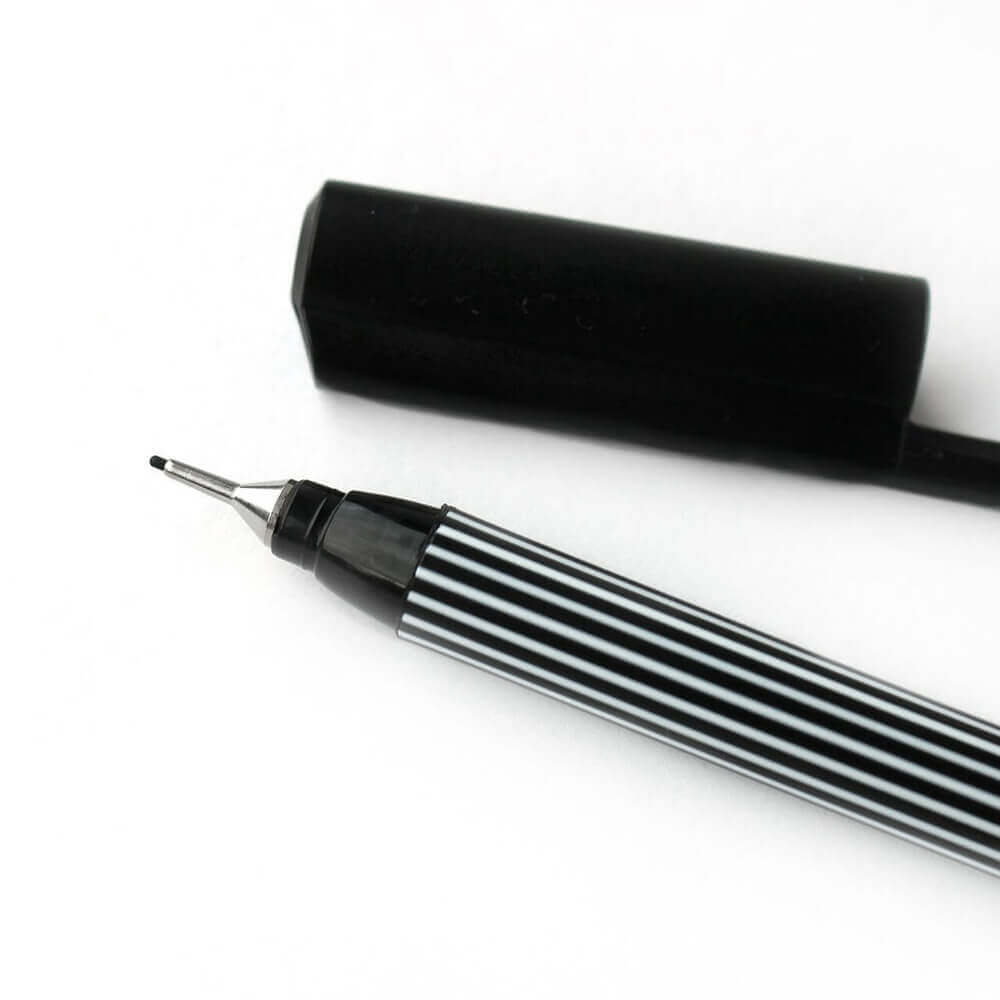 Close-up of HELLO TIME black Edding 55 Fineliner with striped barrel and removable cap on white background