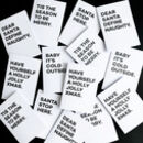 Small thumbnail view of Christmas card pack with bold black festive quotes on white backgrounds.