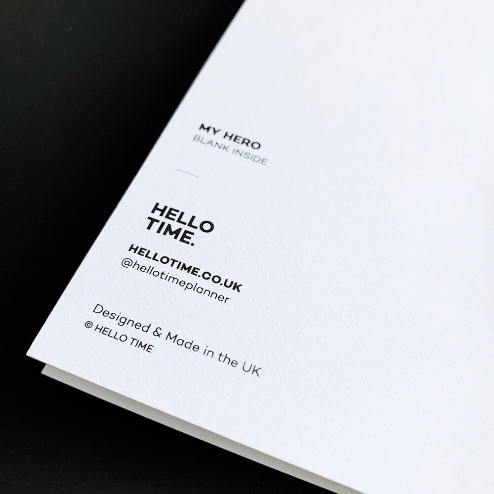 Close-up of the back of My Hero card on luxury white card for Dad’s birthday.