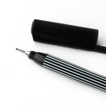 Close up Edding 55 black fineliner pen with striped barrel and 0.3mm tip