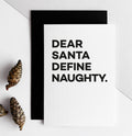 White card with bold black text reading “Dear Santa Define Naughty.”