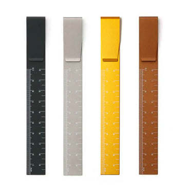 Four clip ruler bookmarks in black, grey, yellow and bronze on white background