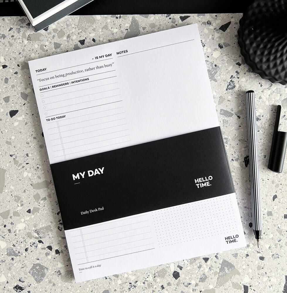 HELLO TIME My Day daily planner pad on terrazzo desk with pen and cap
