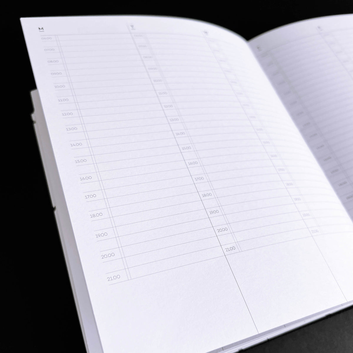 Open HELLO TIME planner page with hourly time-slot grid from 6am to 9pm across the week, black background.