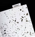 Black and white HELLO TIME planner with inkwell design and “Today” page marker tab visible
