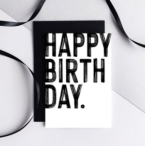 White A6 Happy Birthday card with bold black text, paired with black envelope
