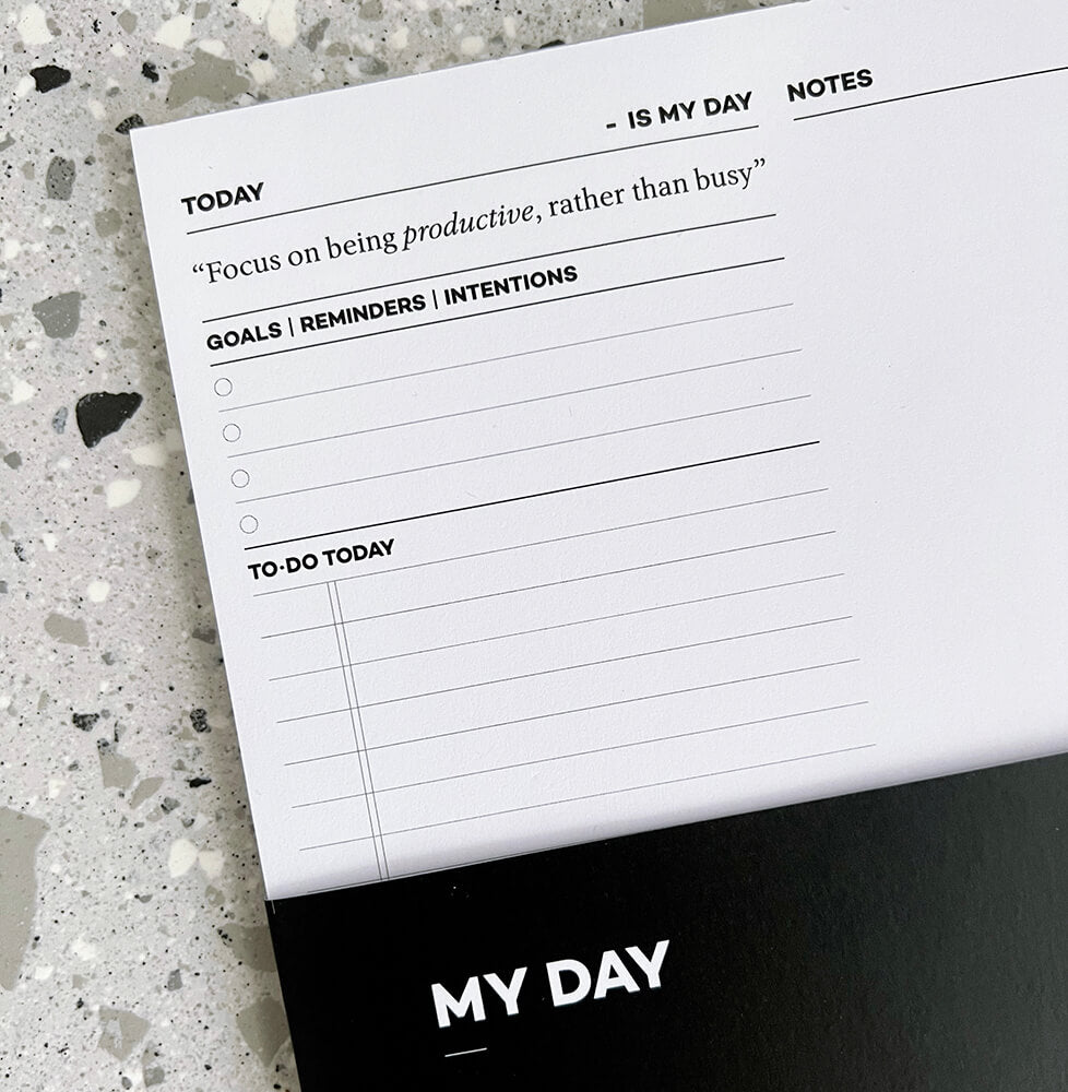 HELLO TIME My Day daily planner pad on terrazzo desk with pen and cap