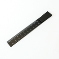 Black metal ruler bookmark with clip, marked with centimetre scale.