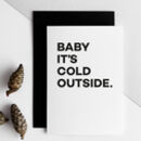 Greeting card with bold black text reading “Baby It’s Cold Outside” on a white background.
