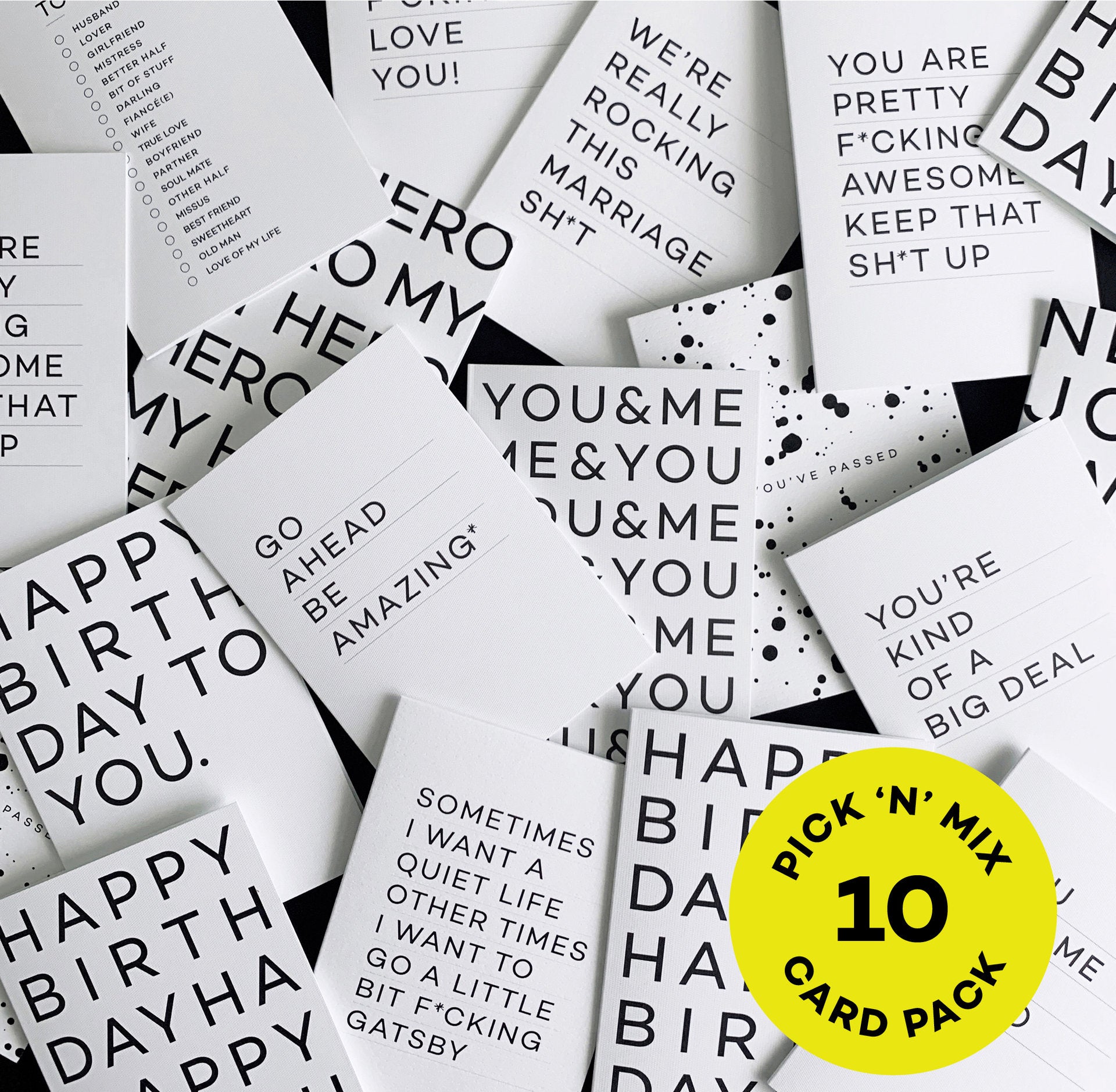 Assorted monochrome greeting cards with bold text designs, pack of 10.