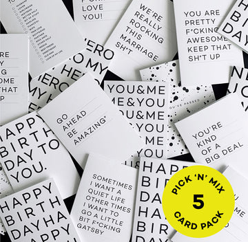 Assorted monochrome greeting cards with bold text designs, pack of 5.