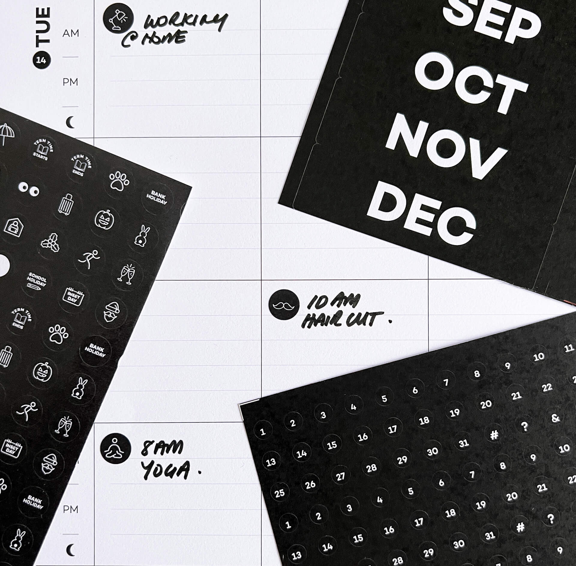 Wall planner page with activity stickers and handwritten plans like haircut and yoga