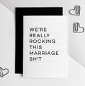 White anniversary card with bold black text reading 