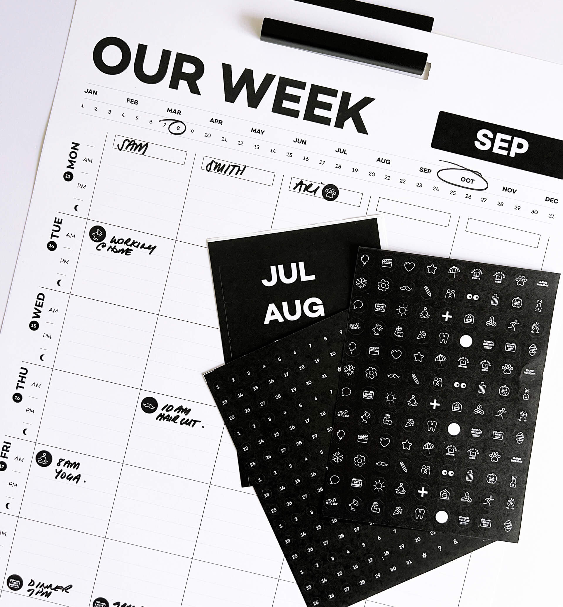 Hello Time weekly wall planner with black sticker sheets for months and icons