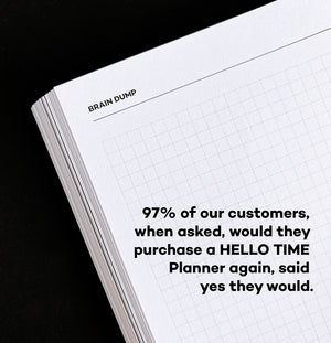 Grid-style brain dump page with customer review printed on corner