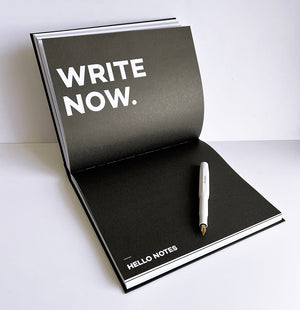 Black notes section in HELLO TIME Planner with white pen and bold “Write Now” text